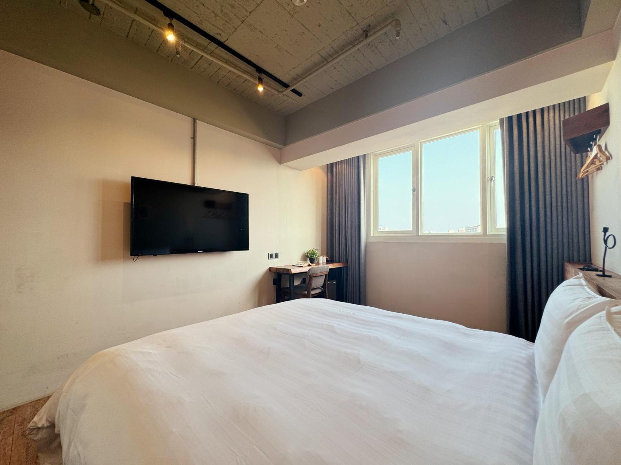 Roaders Hotel Tainan Chengda Habitación foto